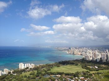 High angle view of buildings by calm blue sea