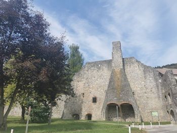 View of historic building against cloudy sky