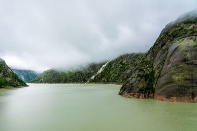 Panoramic view of the grimsel reservoir in switzerland.