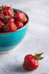 Close-up of strawberries in bowl on table