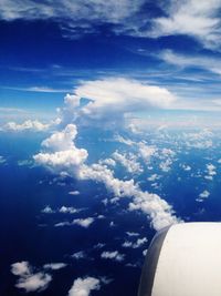 Aerial view of landscape against cloudy sky