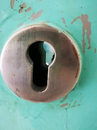 High angle view of rusty metal door