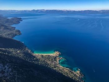 High angle view of sea by rocks