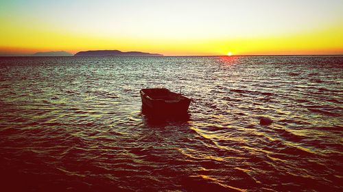 Scenic view of sea at sunset