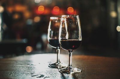 Close-up of wine in glass on table