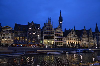 Buildings in city at night