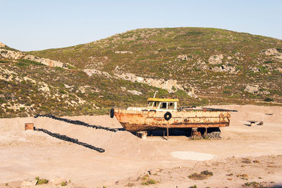 Wrecked and abandoned ship in a remote location in the island