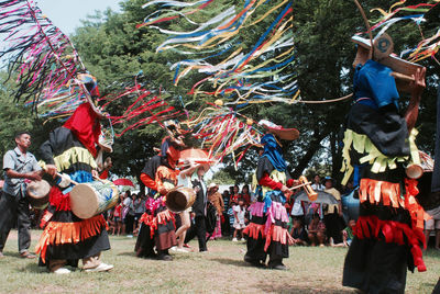 People in costume celebrating festival at park