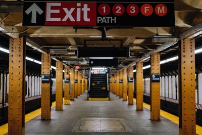 Exit sign on subway station platform