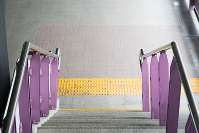 High angle view of empty seats at railroad station