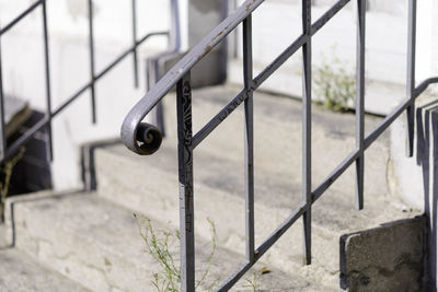 Close-up of metal railing on steps