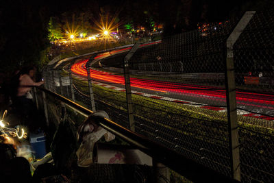 High angle view of light trails on street at night