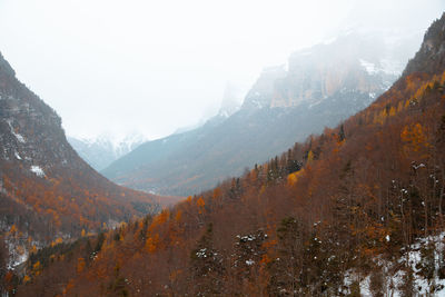 Scenic view of mountains against sky during autumn