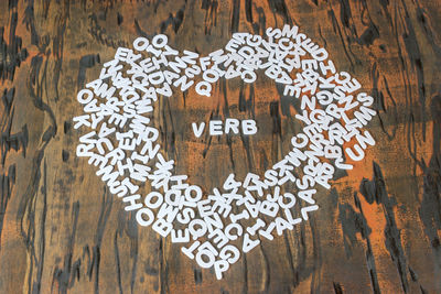 Close-up of heart shape alphabets on table 