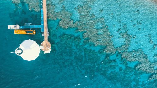 High angle view of floating on swimming pool