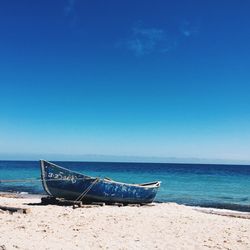 Scenic view of sea against blue sky