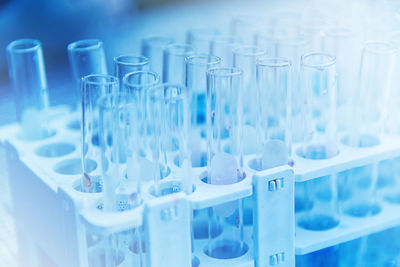 Close-up of empty test tubes in rack