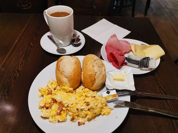 High angle view of breakfast served on table