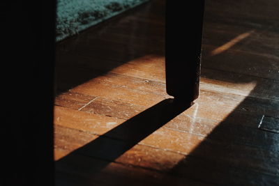 Shadow of people on tiled floor