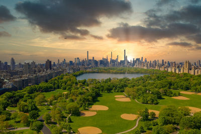 Central park aerial view, manhattan, new york. park is surrounded by skyscraper.