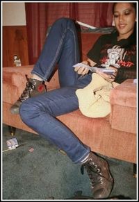 Low section of young man sitting on floor