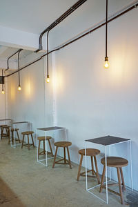 Interior decoration design of coffee cafe decorated with wooden furniture in industrial loft style