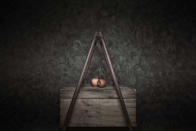 Directly above shot of apples on table against wall