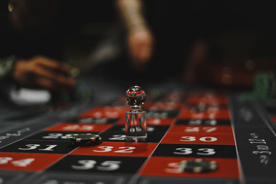 Close-up of hand on table