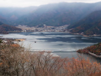 View of river with mountain range in background
