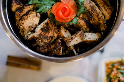 High angle view of meat in bowl on table