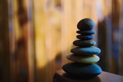 Close-up of stone stack on table