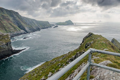 View of calm sea against cloudy sky