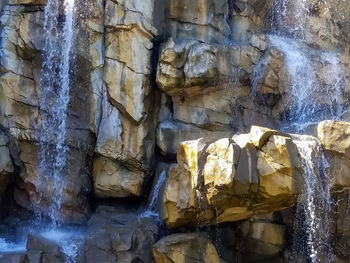 Close-up of water flowing through rocks