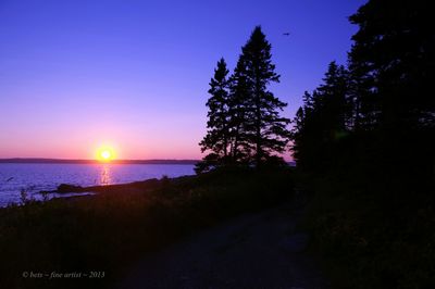 Scenic view of sea at sunset