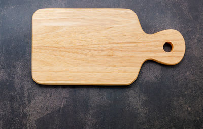 High angle view of knife on cutting board