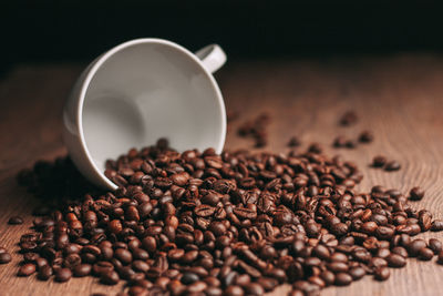 Close-up of coffee beans on table