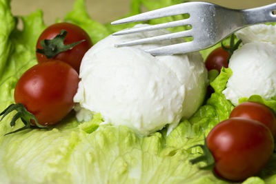 Close-up of fresh fruits in plate