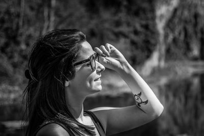 Portrait of young woman wearing sunglasses