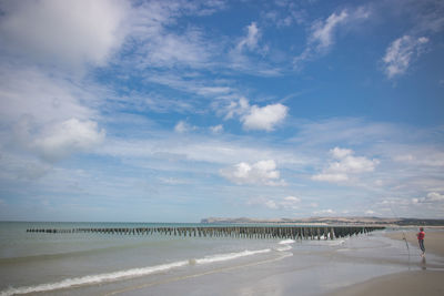 Scenic view of beach against sky