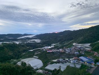 High angle view of buildings against sky