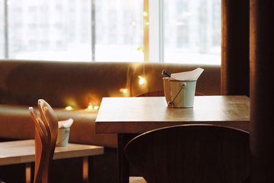 Empty chairs and table in restaurant