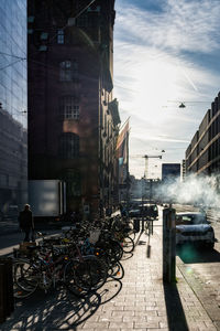 Street amidst buildings in city against sky