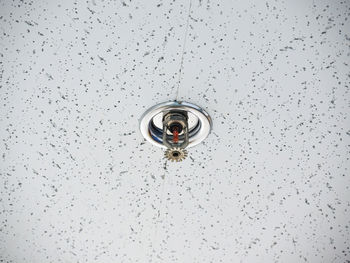 Low angle view of fire sprinkle on ceiling