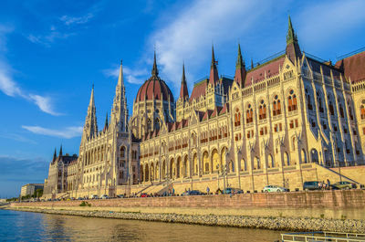 Building of the hungarian parliament from the danube river. budapest, hungary