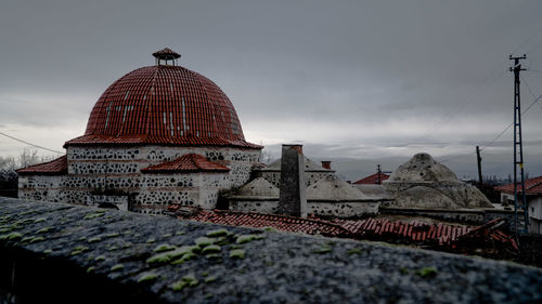 View of temple against sky in city