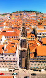 High angle view of buildings in city against sky