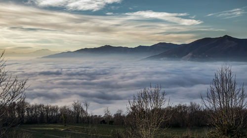 Scenic view of dramatic sky over landscape