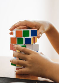 Close-up of hand playing with toy