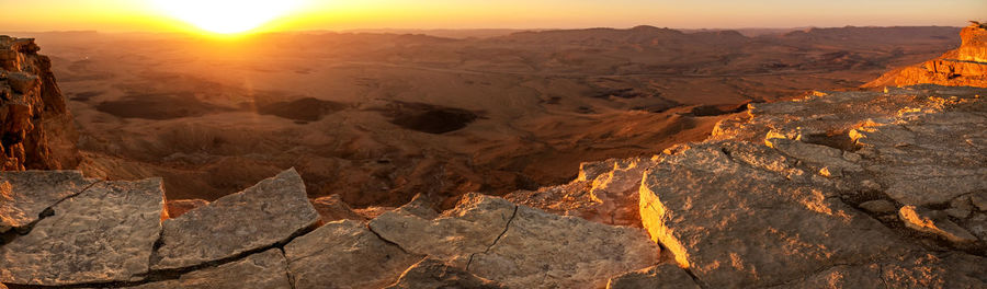 Aerial view of dramatic landscape during sunset