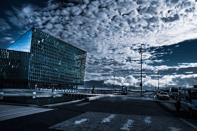 Modern buildings in city against sky